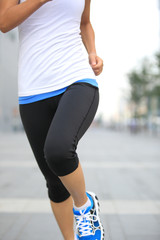 Poster - healthy lifestyle woman running at city