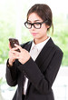 © siraphol - Business woman talking cellphone