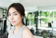 © siraphol - Woman workout at fitness