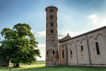 Wall Mural - Romanesque cylindrical bell tower of countryside church