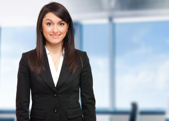 Canvas Print - Smiling businesswoman in the office