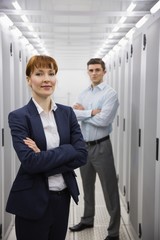 Poster - Team of computer technicians looking at camera
