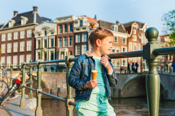 Wall Mural - Outdoor portrait of a cute little girl