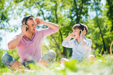 Father and son in park