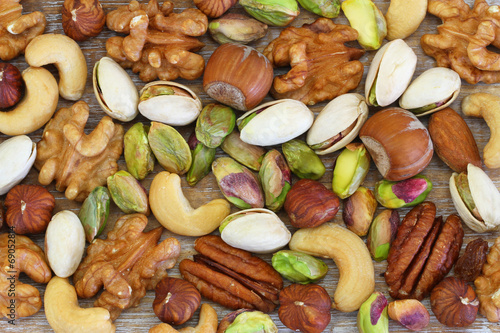 Fotografie, Obraz Selection of nuts, almonds and sultanas, close up
