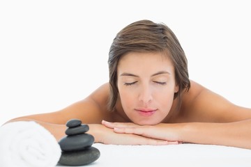 Wall Mural - Close up of a beautiful young woman on massage table