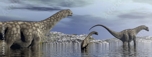 Naklejka samoprzylepna Rodzina dinozaurów argentinosaurus - 3d render