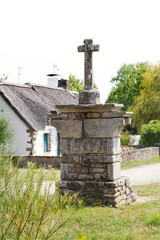 Wall Mural - old stone cross in village de Breca, France