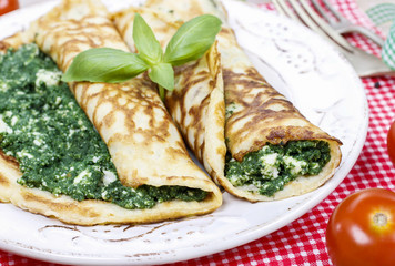 Poster - Mediterranean cuisine: crepes stuffed with cheese and spinach