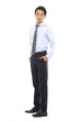 © east2 - young business man standing with hands in pocket
