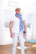 © feelphotoartzm - man with a scarf and white cap posing in the living room