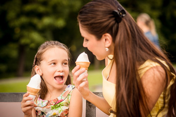 Mother and child enjoying icecream