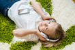 © pyansetia2008 - Happy child listening to music.