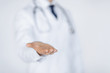 © Syda Productions - male doctor holding something in his hand