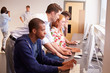 © Monkey Business - College Students Using Computers On Media Studies Course