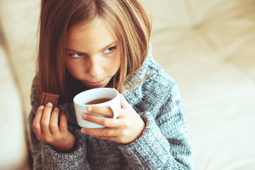 Child drinking tea