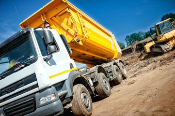 Wall Mural - dumper truck at industrial construction site