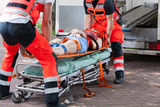 Fototapeta  - Woman after accident on the stretcher