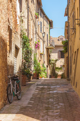 Poster - Sunny streets of Italian city Pienza in Tuscany