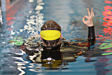 Poster - coach diving in the water, training, command