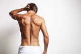perfect fit man from the back in white towel