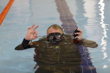 Sticker - man teaches diving in the pool, swim coach