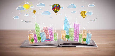 Fototapete - cityscape drawing on open book
