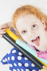 Funny Red-haired Caucasian Girl Making Faces