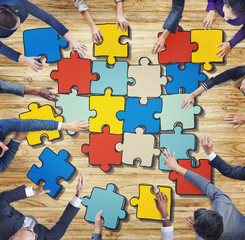 Wall Mural - Group of Business People Forming Jigsaw Puzzle