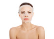 © Piotr Marcinski - Beautiful woman with collagen mask.