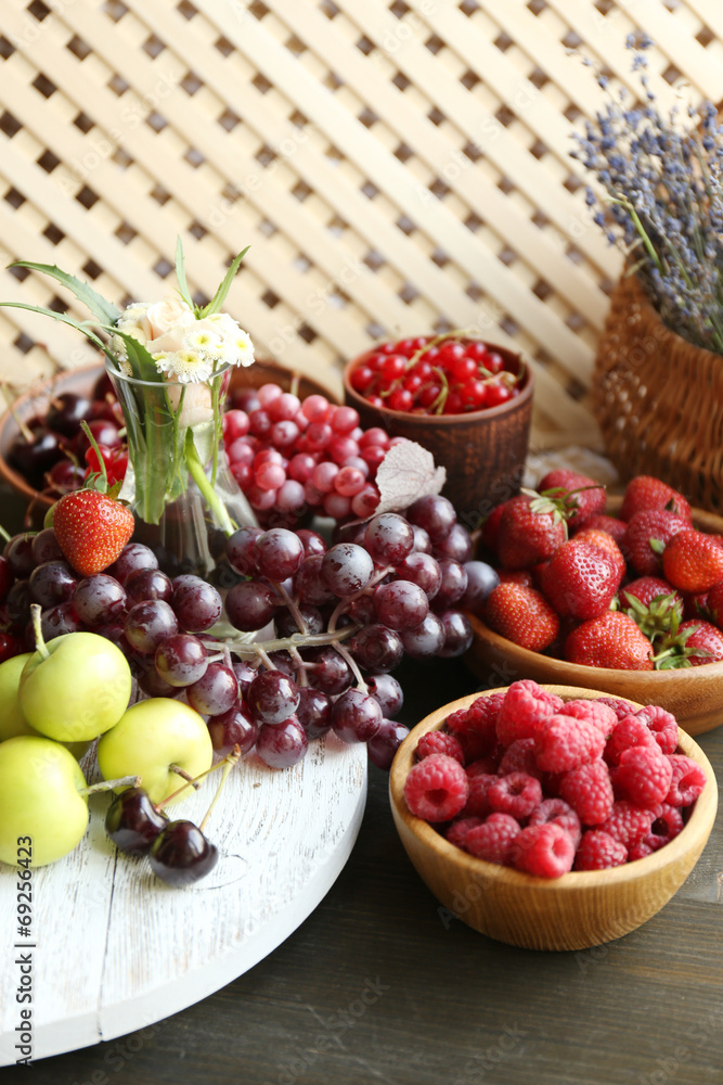 Still life with berries and flowers