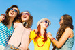 © adam121 - group of young people wearing sunglasses and hat