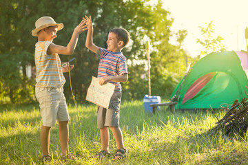 Camp in the tent - two brothers on the camping