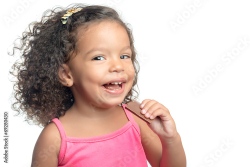 Little Girl With An Afro Hairstyle Eating A Chocolate Cookie Buy