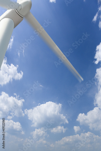 Fotografie, Obraz Low angle view of windmill and cloudy sky