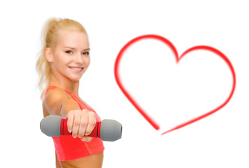 Poster - smiling beautiful sporty woman with dumbbell