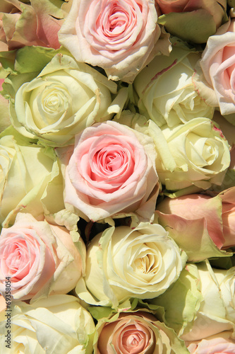 Fototapeta na wymiar White and Pink roses in wedding arrangement