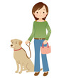 © koti - 犬の散歩をする女性