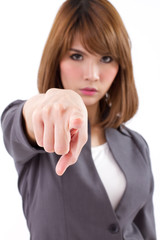 Canvas Print - angry business woman pointing at you, white background