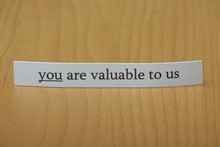 You Are Valuable To Us Typed On A Strip Of Paper