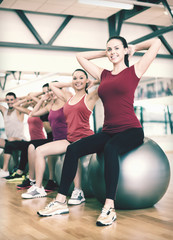 Canvas Print - group of people working out in pilates class