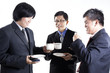 © kungverylucky - Three Asian business man with coffee break having conversation