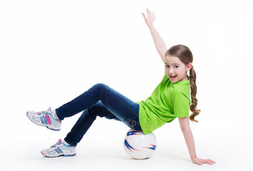 Wall Mural - Happy little girl sitting on the ball.