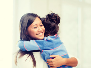 Canvas Print - hugging mother and daughter