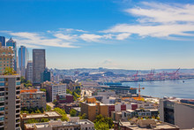 Panoramic View Of Seattle Downtown And Mountain Rainer Looming O