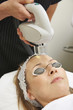 © highwaystarz - Beautician Carrying Out Intense Pulse Light Treatment