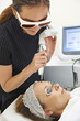 © highwaystarz - Beautician Carrying Out Q Switch Laser Treatment