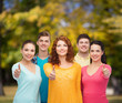 © Syda Productions - group of smiling teenagers over green park