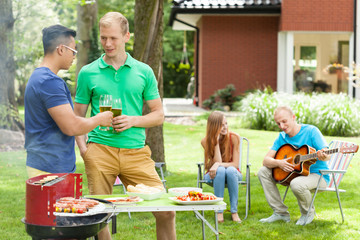 Poster - Friends talking on a garden party