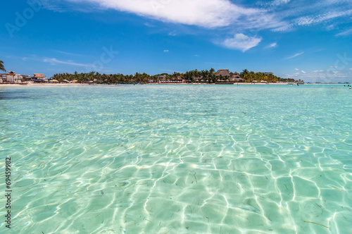 Obraz na płótnie canvas czteroczęściowy "tetraptyk" Tropikalne morze i isla kobiety linia brzegowa, Mexico